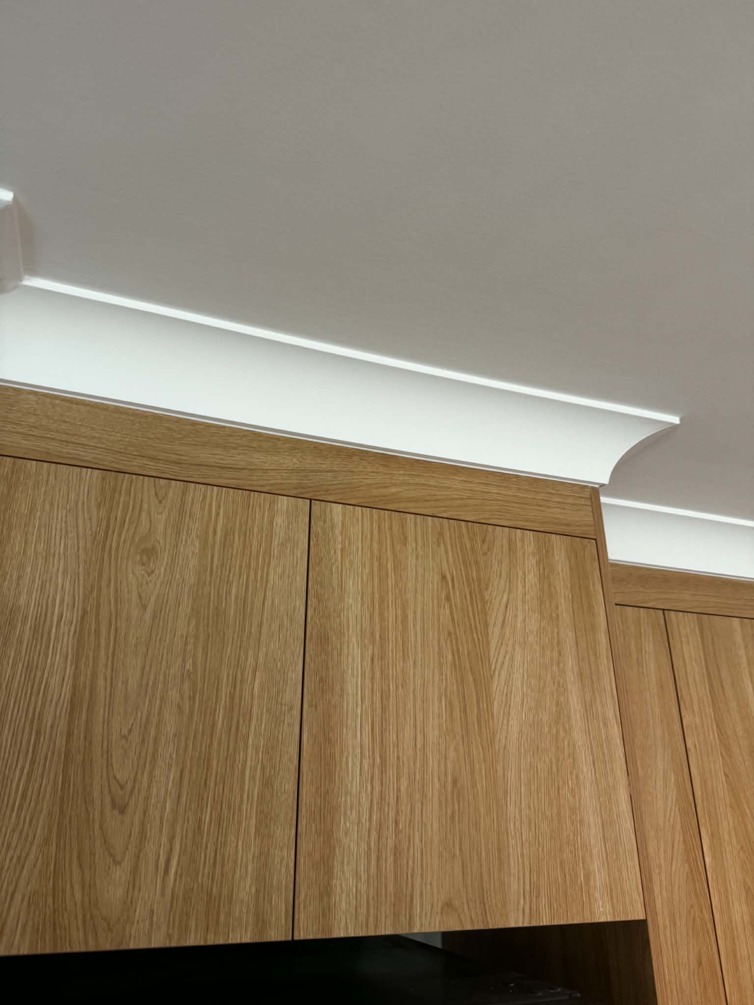 Protecting cupboards to get the cornices up — Plasterer work by A+S Poljak Plasterers in Sinnamon Park