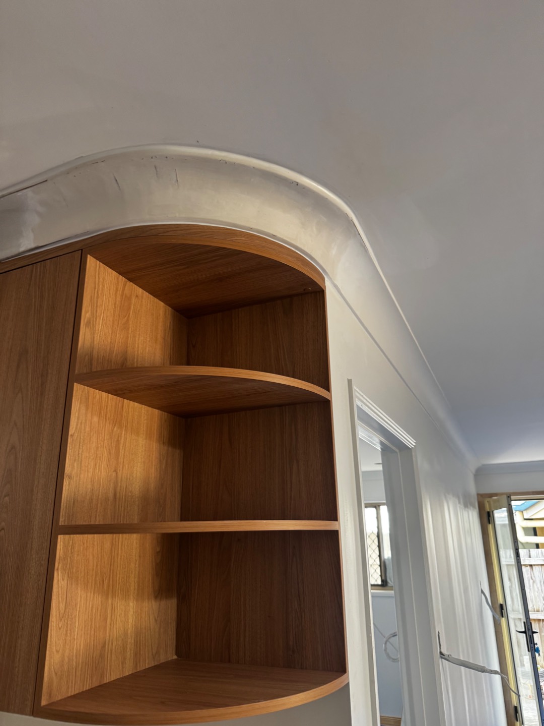 It’s all in the details on this one!
Curved cornice finish in the kitchen. — Plasterer work by A+S Poljak Plasterers in Sinnamon Park